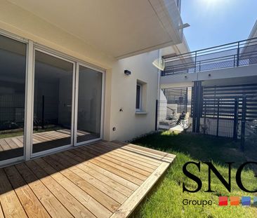 T2 AVEC JARDIN/TERRASSE ET DEUX PARKINGS - Photo 4