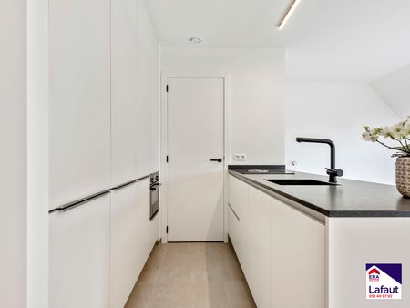 Duplexappartement van 113 m² met 2 slaapkamers en terras. - Photo 4