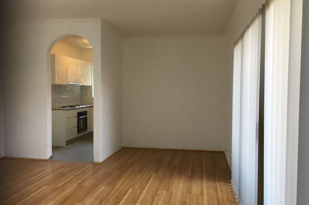 CONVENIENTLY LOCATED 2 BEDROOM UNIT - Photo 1