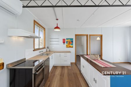 Coastal Living at Its Best – 3-Bedroom Unit Just Minutes from the Beach! - Photo 3