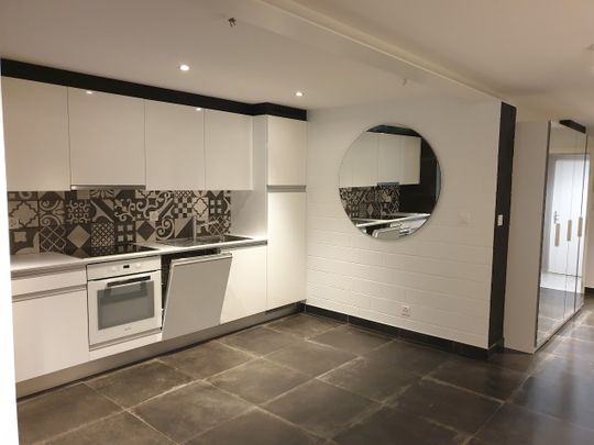 Charmant appartement de 3,5 pièces au rez-de-chaussée avec terrasse privée - Photo 1