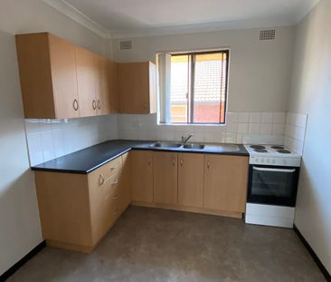 Convenient & Centrally Located Unit - Photo 2