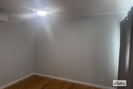 TAREE WEST - Stylishly Renovated Home with Expansive Decking - Photo 2