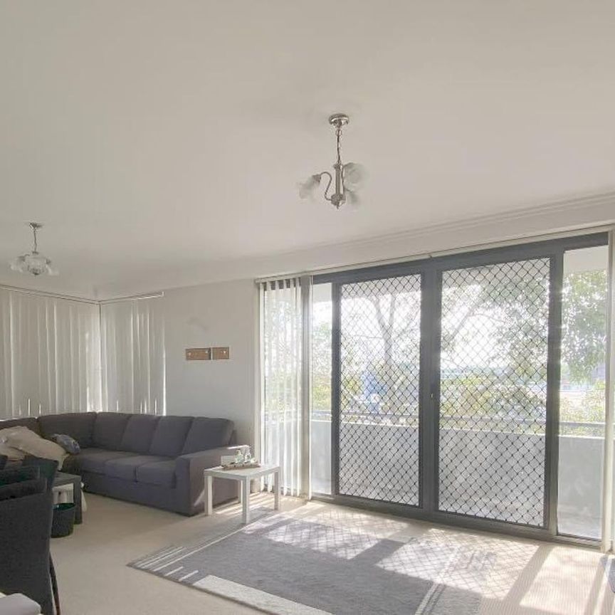 The "Ultimate Convenience" - 2 Mins to Train! Private 1BR Unit with 2 Balconies, Pool & Gym - Photo 1