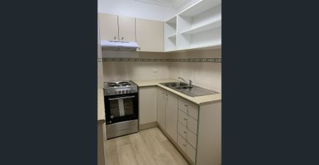 A Quiet Sanctuary Away from The Bustle of The Inner-City with New Flooring, New Paint and New Cooking Appliance. - Photo 5