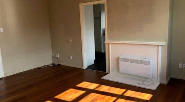 SUNNY AND JUST A SHORT WALK TO TOWN - Photo 1