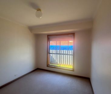 Neat Three Bedroom Unit - Photo 2