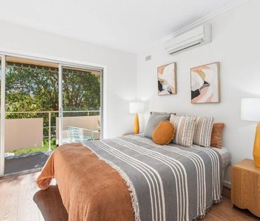 Charming Two-Storey Townhouse in a Peaceful Eastern Suburb Setting! - Photo 4