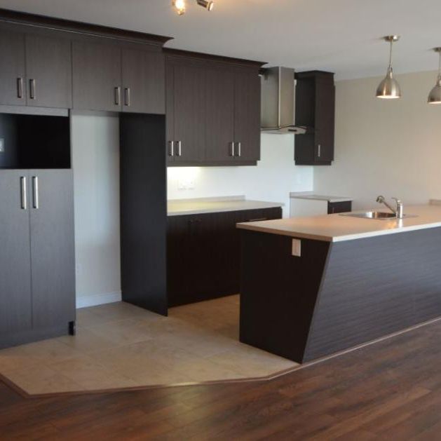 VOTRE REFUGE MODERNE | Grand 4½ Rez-de-Jardin à Val-Bélair - Photo 1