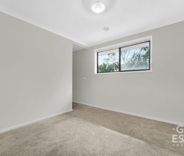 Modern Family Home with Multiple Living Areas - Photo 2