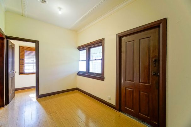 Spacious 3-Bedroom Home with Yard & Parking - Photo 1