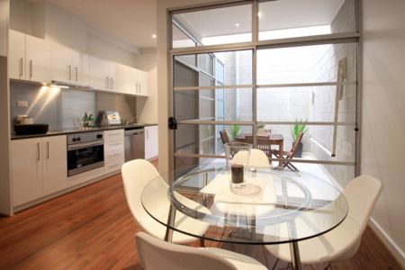 Contemporary Comfort Meets Prime Location! - Photo 3