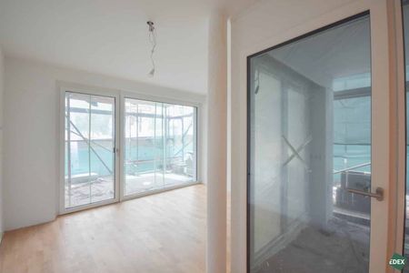 Erstbezug: Schöner 3-Zimmer-Neubau mit Terrasse und Garten - Photo 4