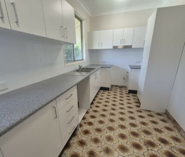 Neat & Tidy 3-Bedroom Home with Spacious Backyard! - Photo 3