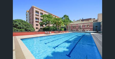 Stylish Loft Living with Pool & Gym - Photo 5