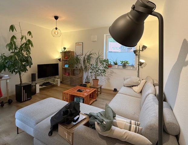 Attraktive 2-Zimmer-Wohnung im Erdgeschoss mit Terrasse, Garten, Tiefgaragenstellplatz und Keller - Foto 1