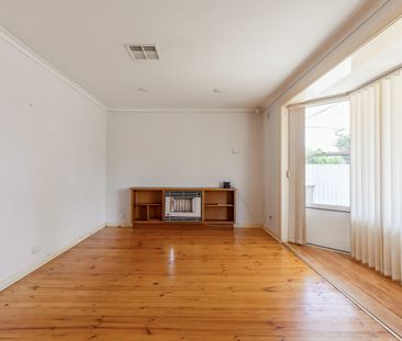 Spacious 3-Bedroom Home with Large Backyard! - Photo 2