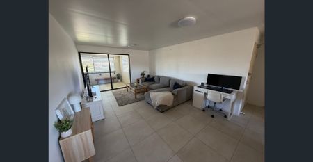 For Rent: Spacious Partially Furnished 2-Bedroom Unit in the heart of Forest Lake - Photo 2