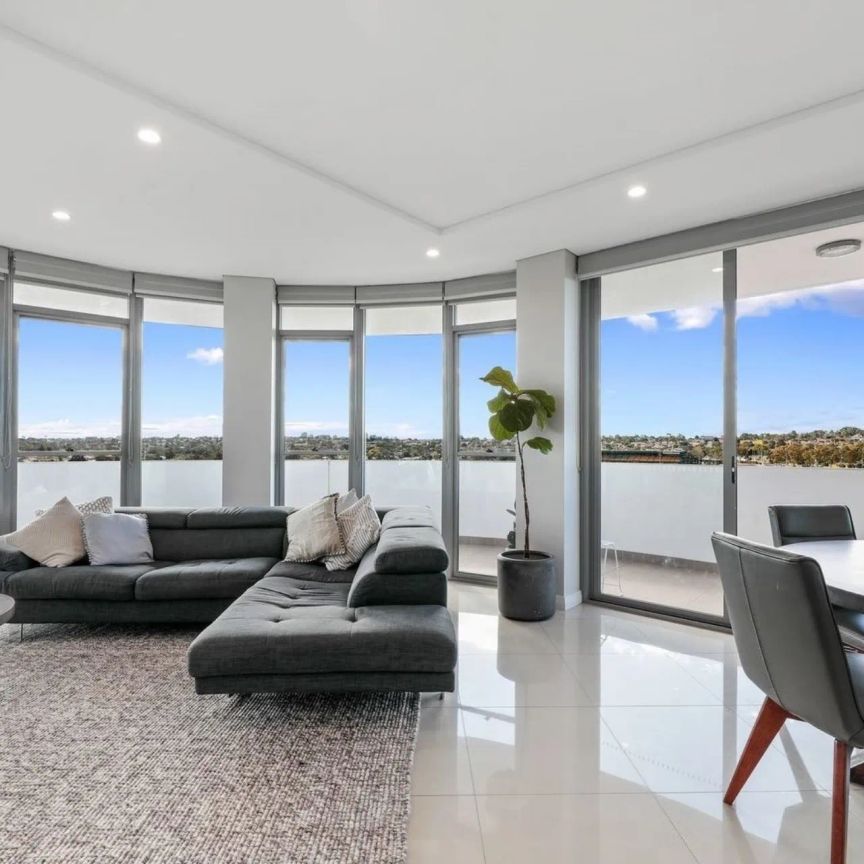 Sun-Drenched Sixth-Floor Living with an Expansive Wraparound Balcony - Photo 1