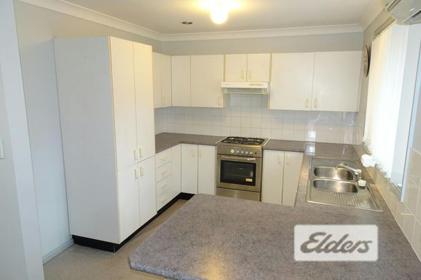 Tidy Convenient Home in Quiet Complex - Photo 1