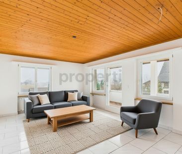 Generous 4.5-room apartment with mountain view in Maschwanden - Photo 1