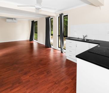 Elevated 4-bedroom home with granny flat - Photo 3
