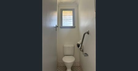 Solid Brick Home with Sunlit Interiors in a Convenient Location - Photo 4