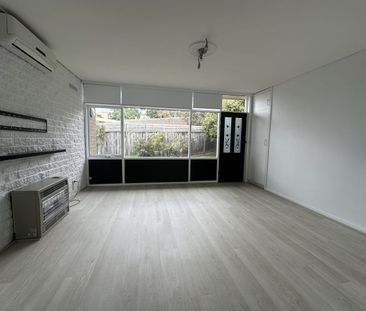 UPDATED UNIT BY THE BEACH - Photo 2