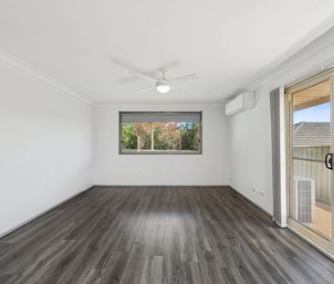 Low maintenance living in convenient location - Photo 1