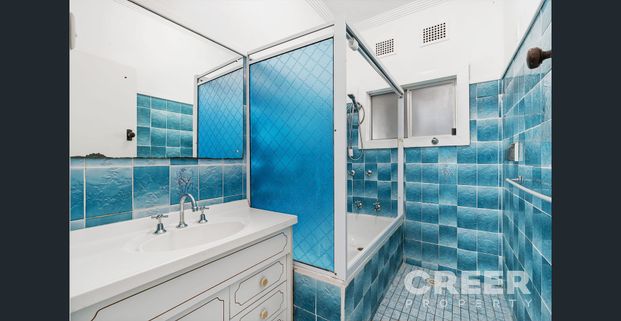 CUTE AND CONVENIENT FAMILY HOME - Photo 1