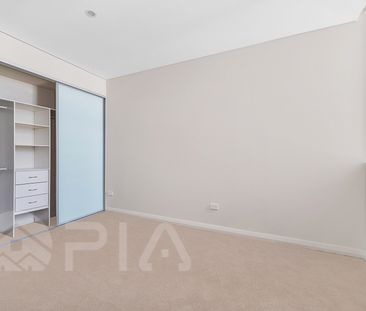 Modern 2 bedroom apartment close to amenities for lease - Photo 3