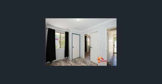 Spacious 4 Bedroom, 2 Bathroom Home in a Prime Location! - Photo 1