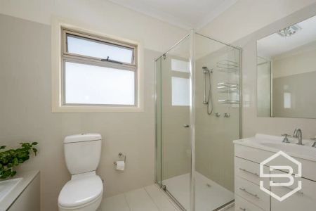 “Spacious townhouse offering low-maintenance living” - Photo 2