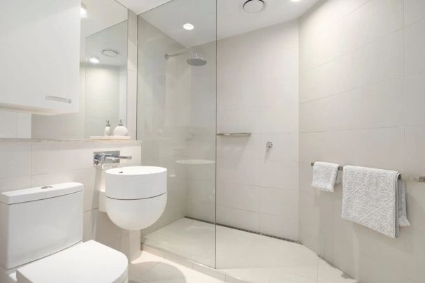 Light-Filled and Chic Bayside Living with Rooftop Oasis! - Photo 1