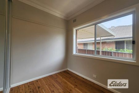 Freshly Updated Family Home in a Convenient Regents Park Location - Photo 4