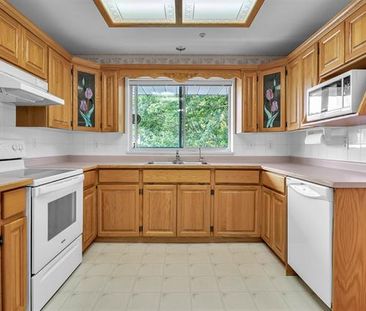 Spacious 55+ Condo with Elevator Access - Photo 4