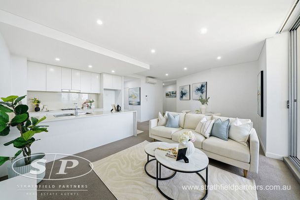 Modern Two-Bedroom Apartment in Desirable Strathfield Locale - Photo 1