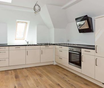 Kernsanierte und großzügige City-Maisonette mit Balkon zum Wohlfühlen - Photo 1