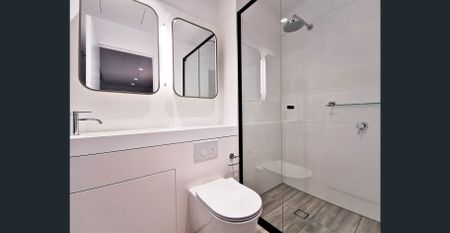 CONVENIENT CBD LIVING - 2 BED 2 BATH APARTMENT - Photo 3