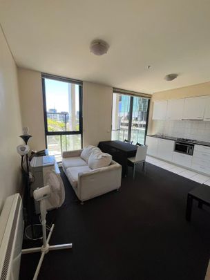 Furnished 2-Bedroom Apartment in Prime Melbourne CBD Location - Photo 1