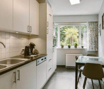 Appartement te huur in Genk voor € 850 met 1 slaapkamer - Photo 2
