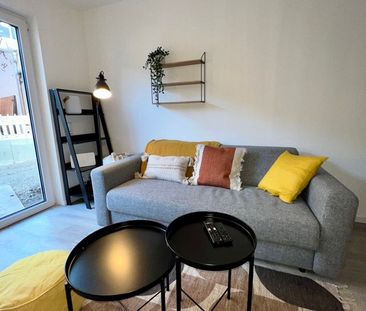 Exklusives Apartment mit Terrasse in zental gelegenem Neubau - Photo 4