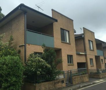2-Bedroom Townhouse with Garage - Photo 1