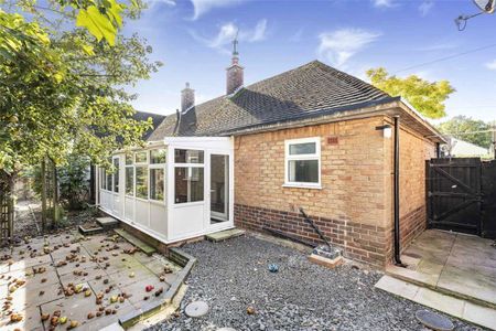 A three bedroom detached bungalow situated within the Village of Burton Green. - Photo 2