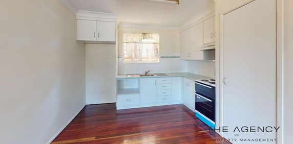 Neat & Tidy Unit In A Convenient Location! - Photo 2