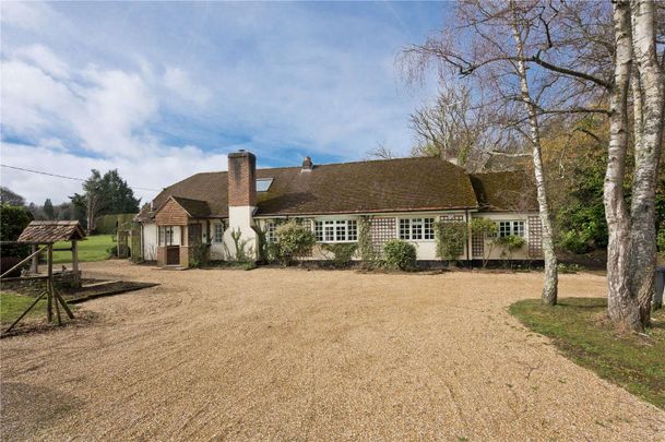 An idyllic family home in a rural setting just outside the village of Church. - Photo 1