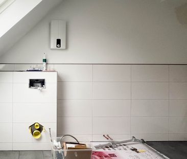 Naturnah wohnen – Sanierte Dachgeschosswohnung in Overath-Blindenaaf - Photo 4