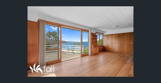 Light-Filled Living With Water Views - Photo 1