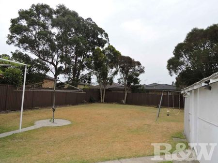 Neat and tidy large three-bedroom family home - Photo 5