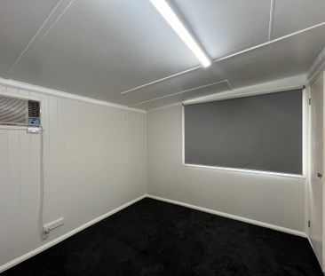 Three Bedroom Home with Sunroom - Photo 4